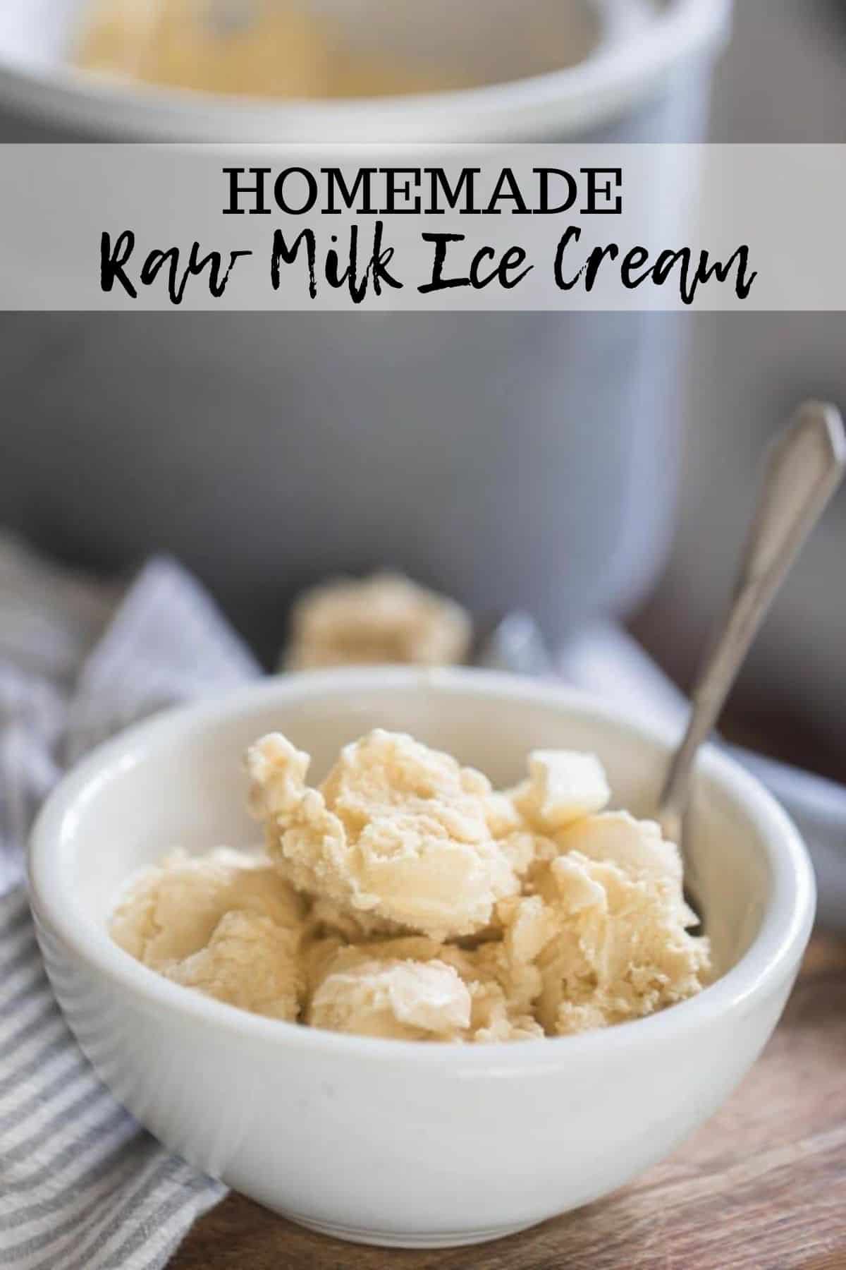 raw milk ice cream in a white bowl with a spoon on a wooden table with the ice cream canister in the background