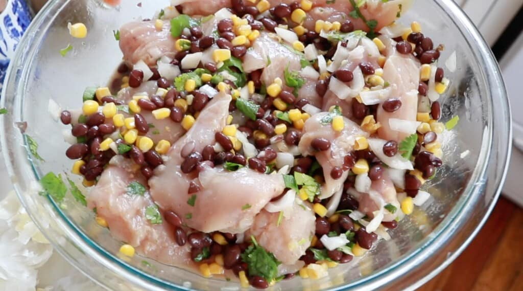 Cilantro Lime chicken with corn and black beans in a glass bowl