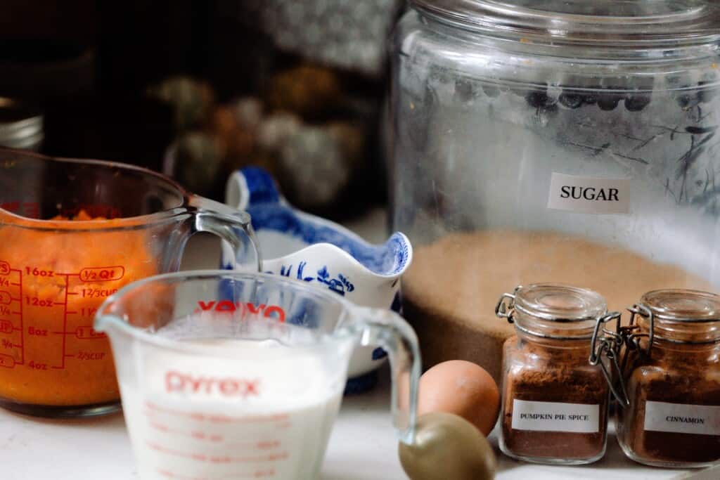 pumpkin pie ingredients on a white countertop