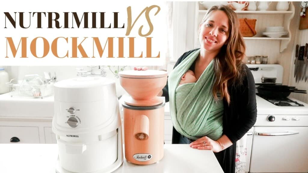 a woman standing in her white farmhouse kitchen next to her island with a Nutrimill and Mockmill beside her