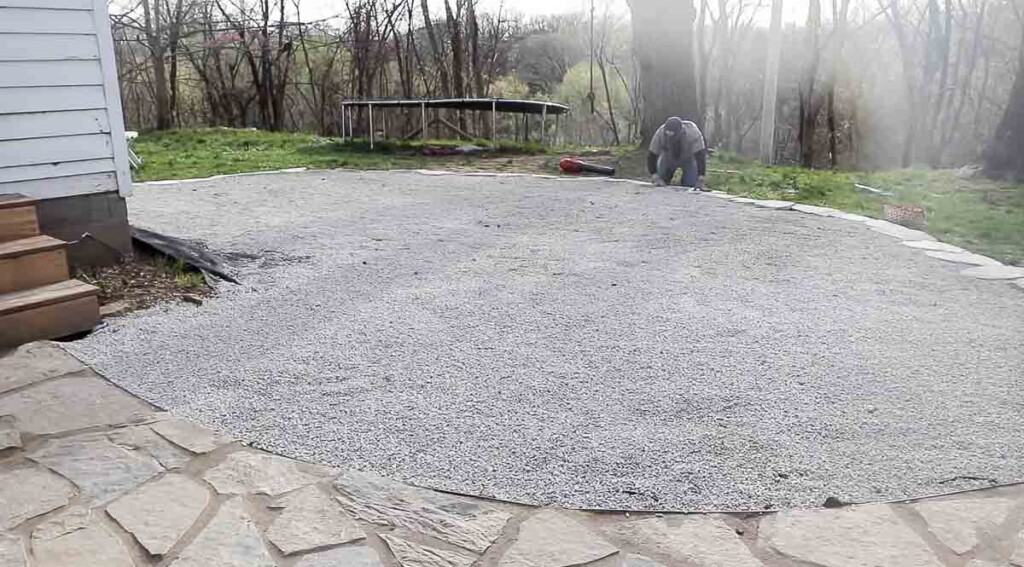 pea gravel smoothed out over a patio