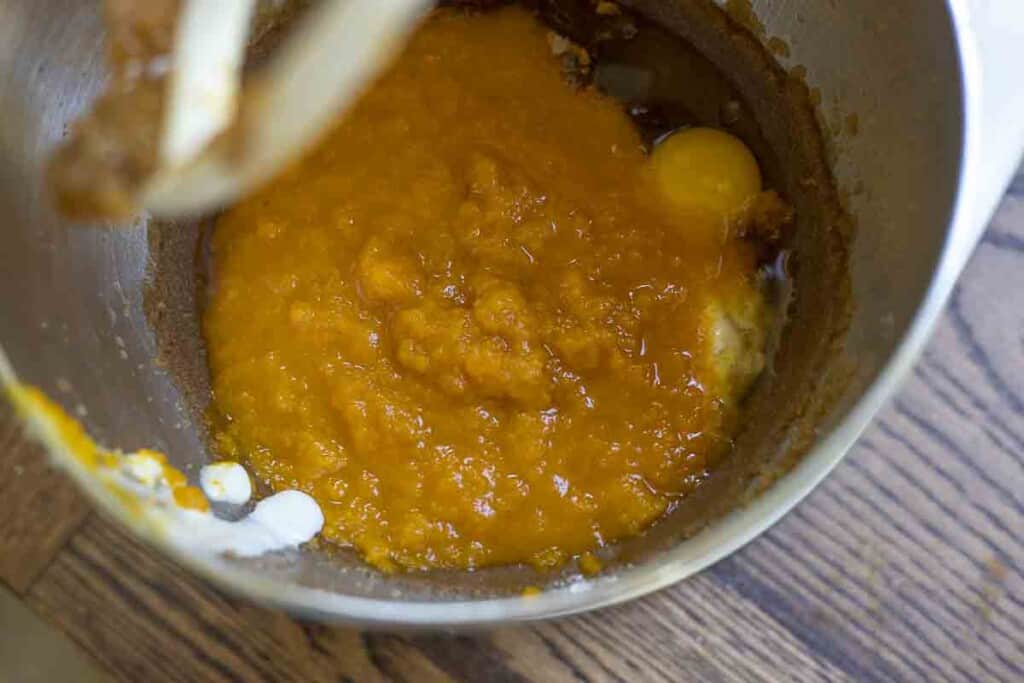 pumpkin puree, eggs, brown sugar, sourdough starter in metal stand mixer bowl