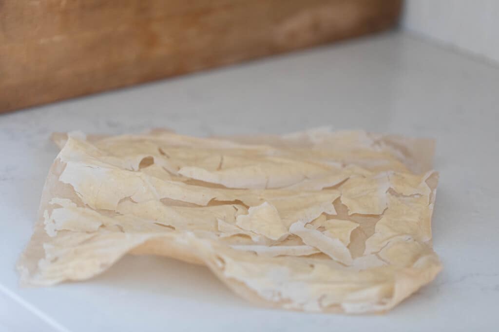 dry sourdough starter on a white countertop