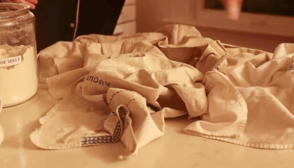 during bowls lined with tea towels with flour