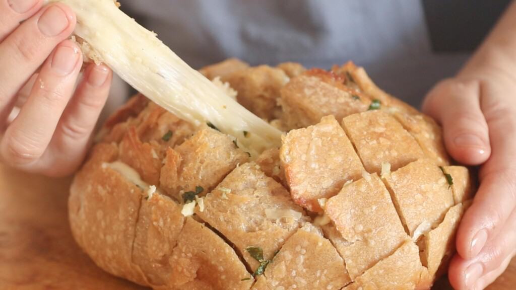 Perfect cheese pull from a baked sourdough pull apart bread