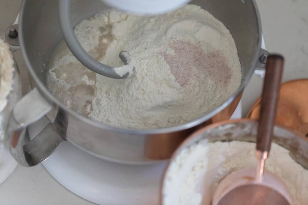 flour added to a stand mixer bowl