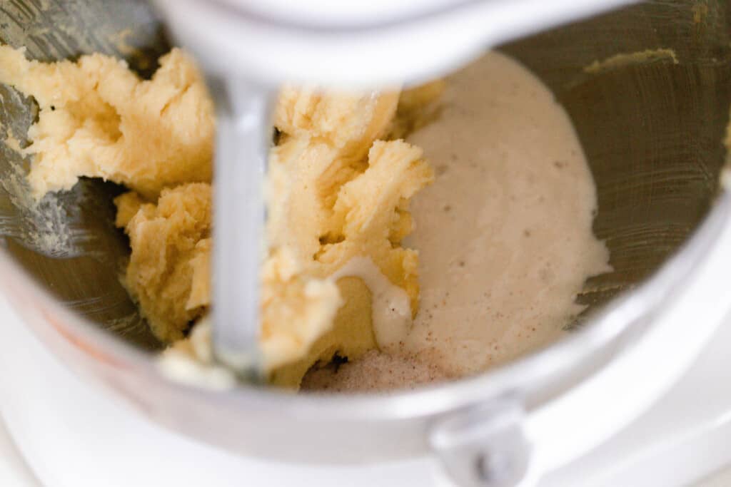 a stand mixer mixing the ingredients for sourdough shortbread cookies including starter