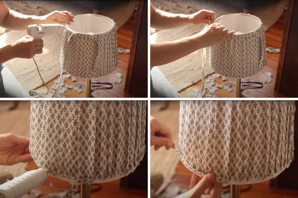 Hot glueing long strips around the edges of a lampshade to create a DIY pleated lampshade