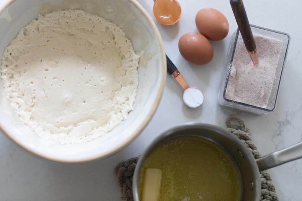sourdough buttermilk pancake ingredients on a white countertop