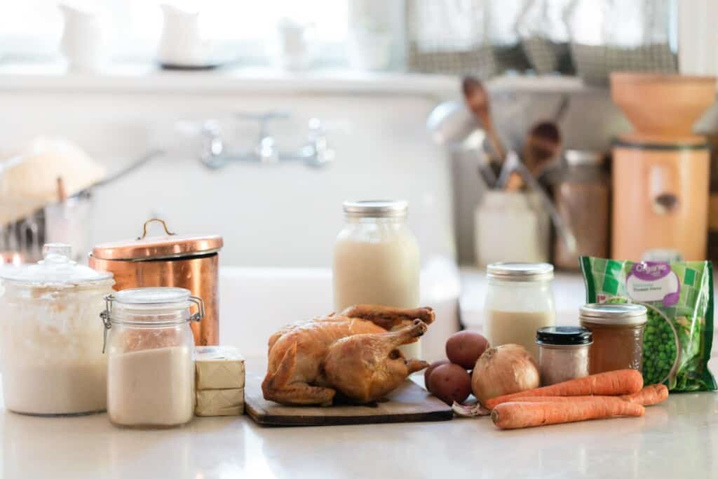 chicken pot pie ingredients on a white countertop