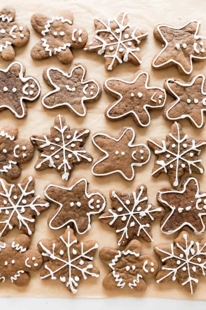 decorated gingerbread cookies on parchment paper