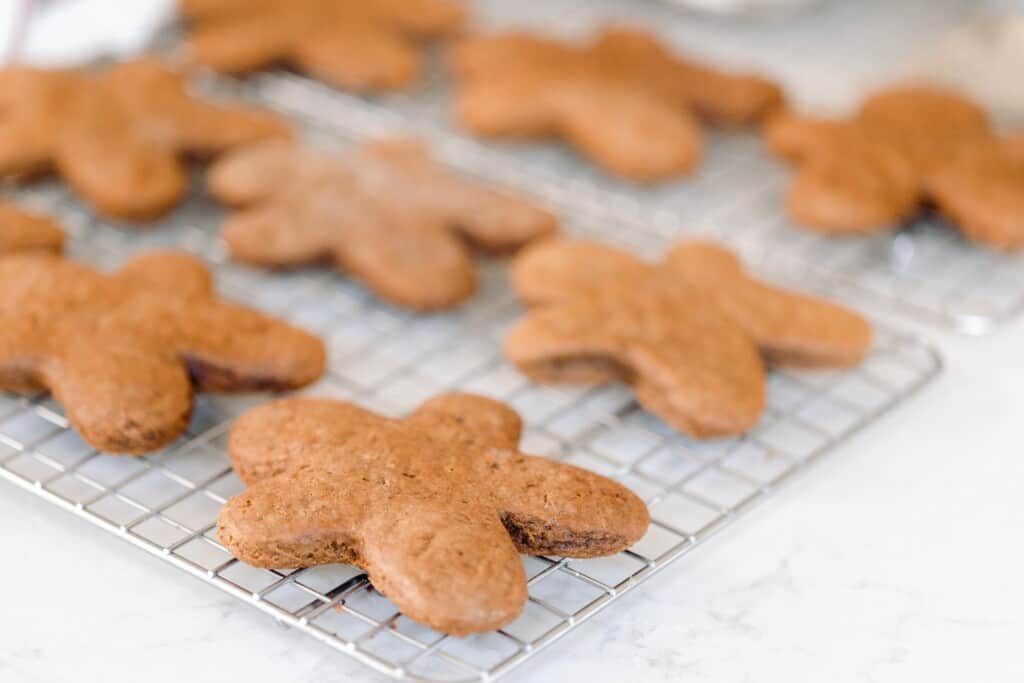 undecorated gingerbread man on a wire rack