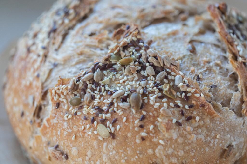 Close up of a seeded sourdough bread