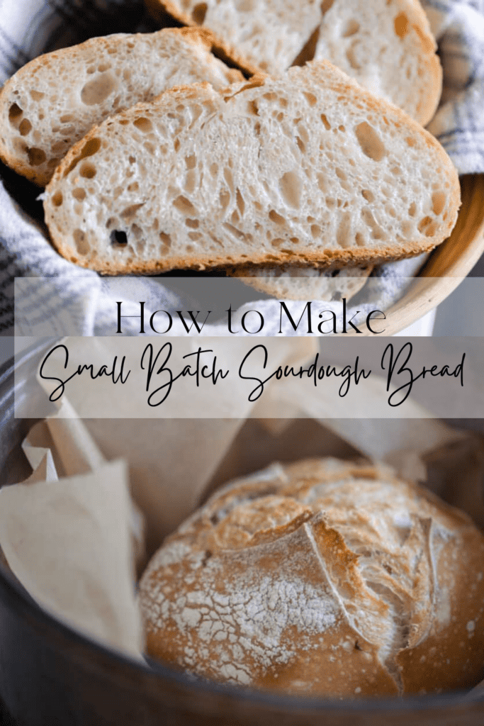 Slices of small batch sourdough bread in a bowl lined with a blue and white checkered tea towel plus a small batch sourdough boule in a parchment paper lined dutch oven baked to golden brown