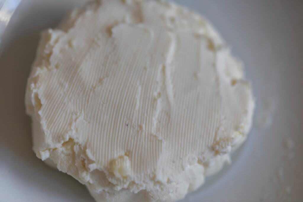 A circular block of kefir cheese