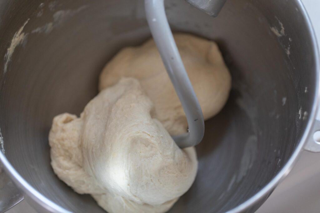 bread dough in a stand mixer bowl