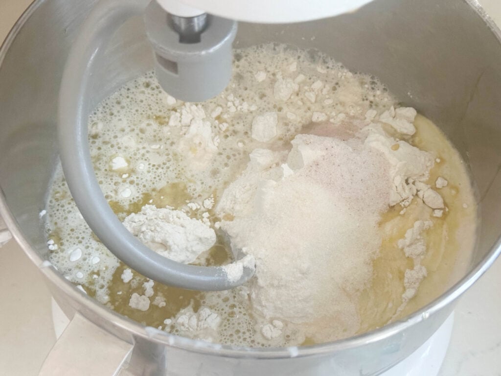 flour, water, sourdough starter, olive oil and salt in a stand mixer bowl with a dough hook
