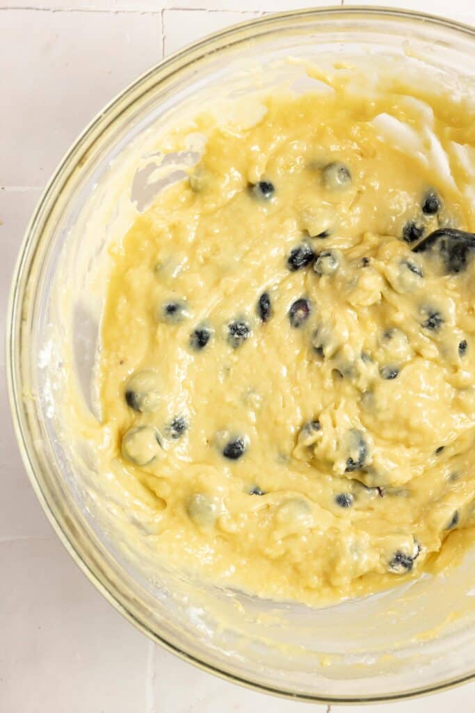 blueberry sourdough bread batter in a large glass bowl