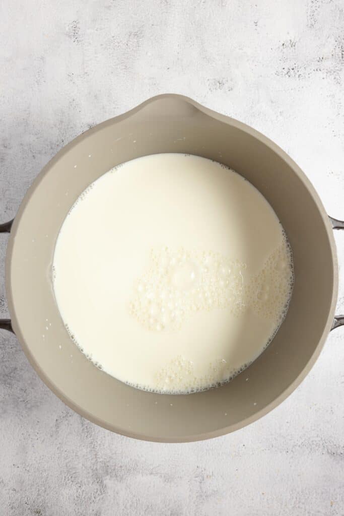 whole milk in a pot ready to be boiled