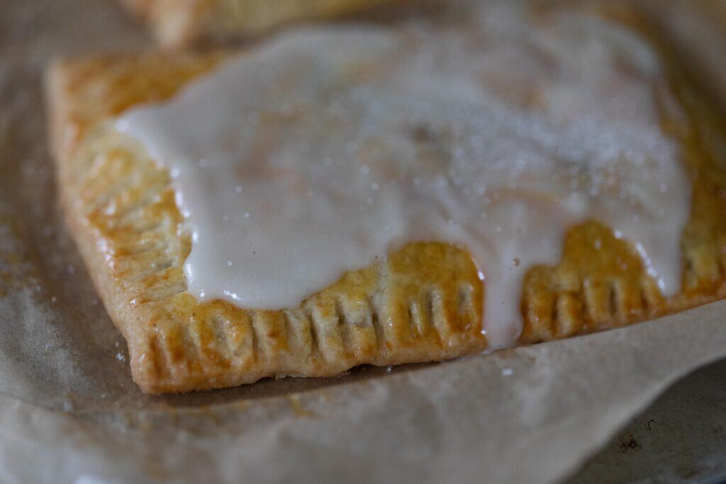 Close up of a sourdough pop tart with a white glaze