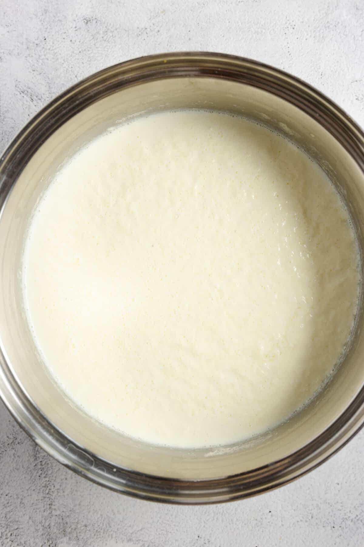 curdled milk in a pot.