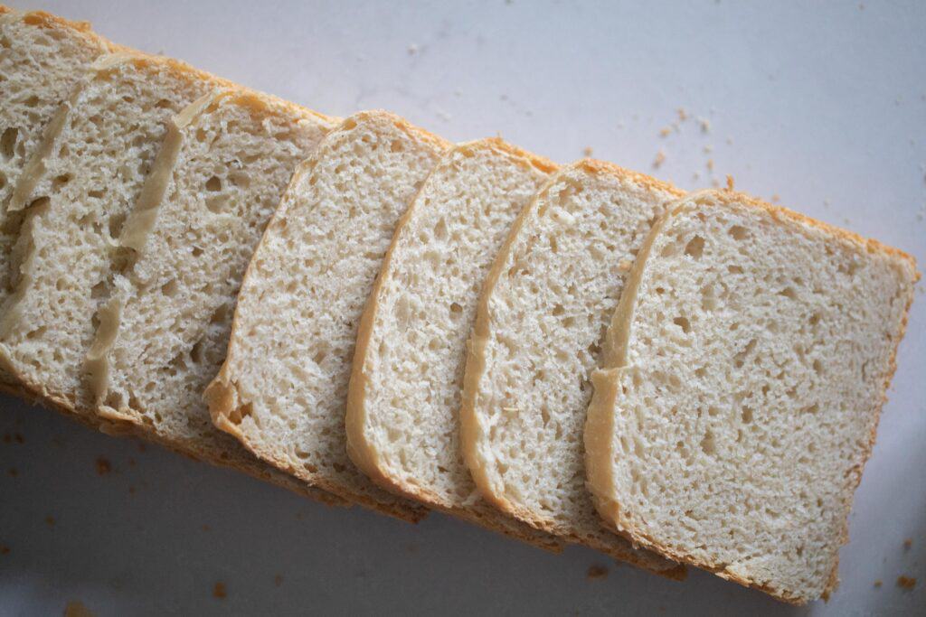 Slices of pain de mie bread layered in a horizontal line