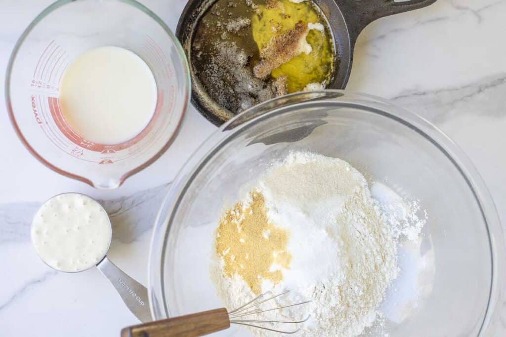 sourdough cheddar biscuits ingredients in a bowl 