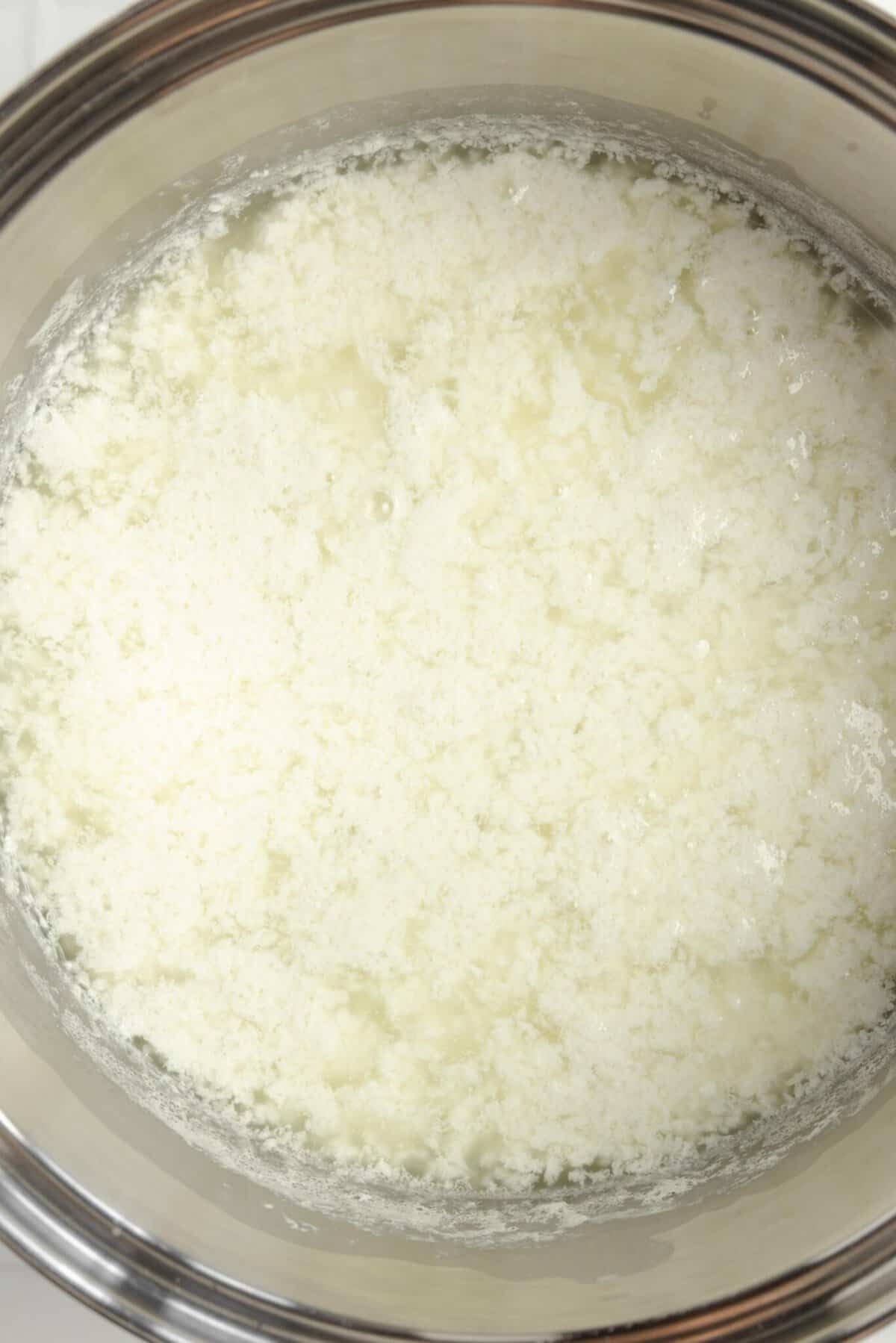 Milk and vinegar in a pot.