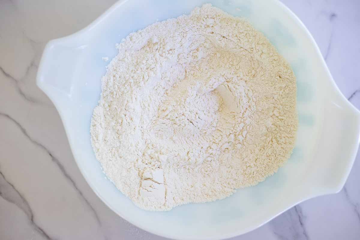 Flour, baking soda, and salt in a bowl.