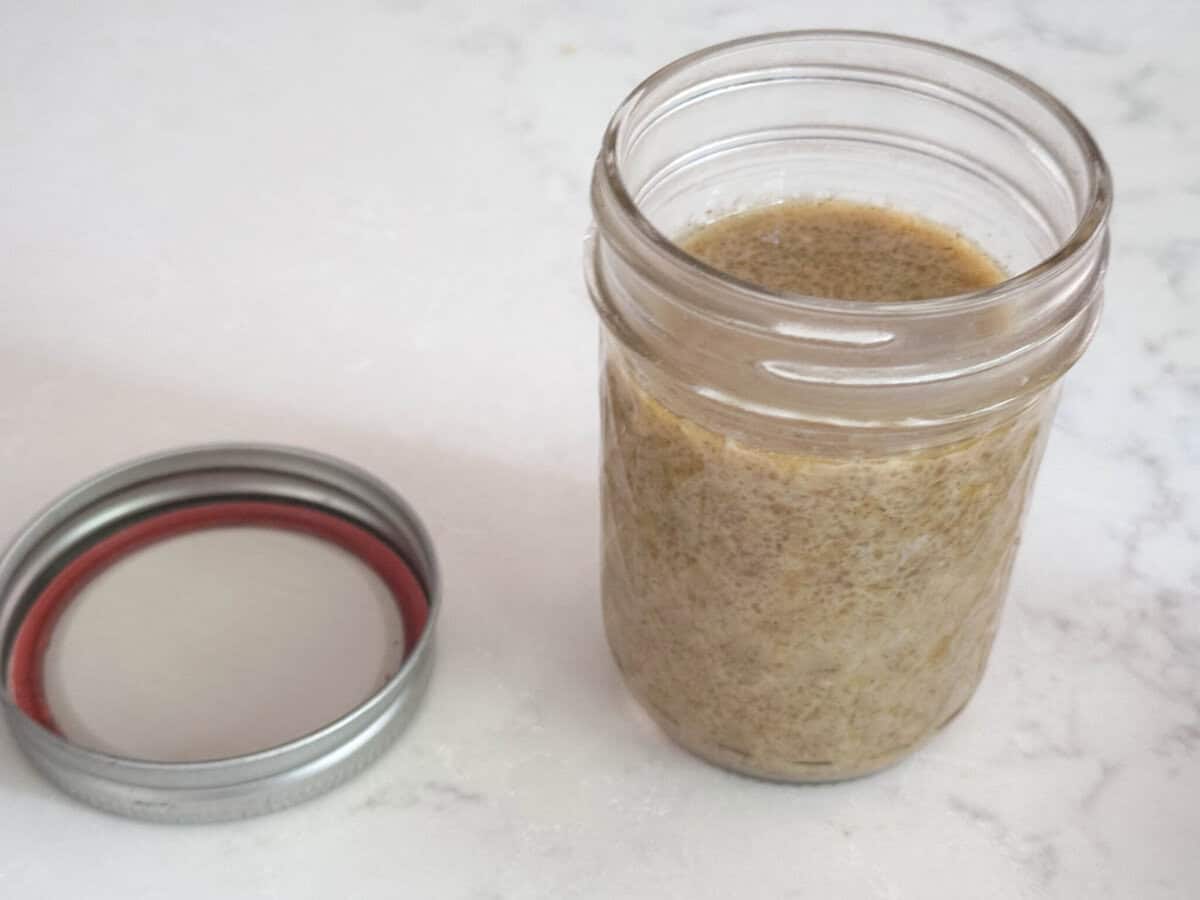 Greek chicken marinade in a mason jar.