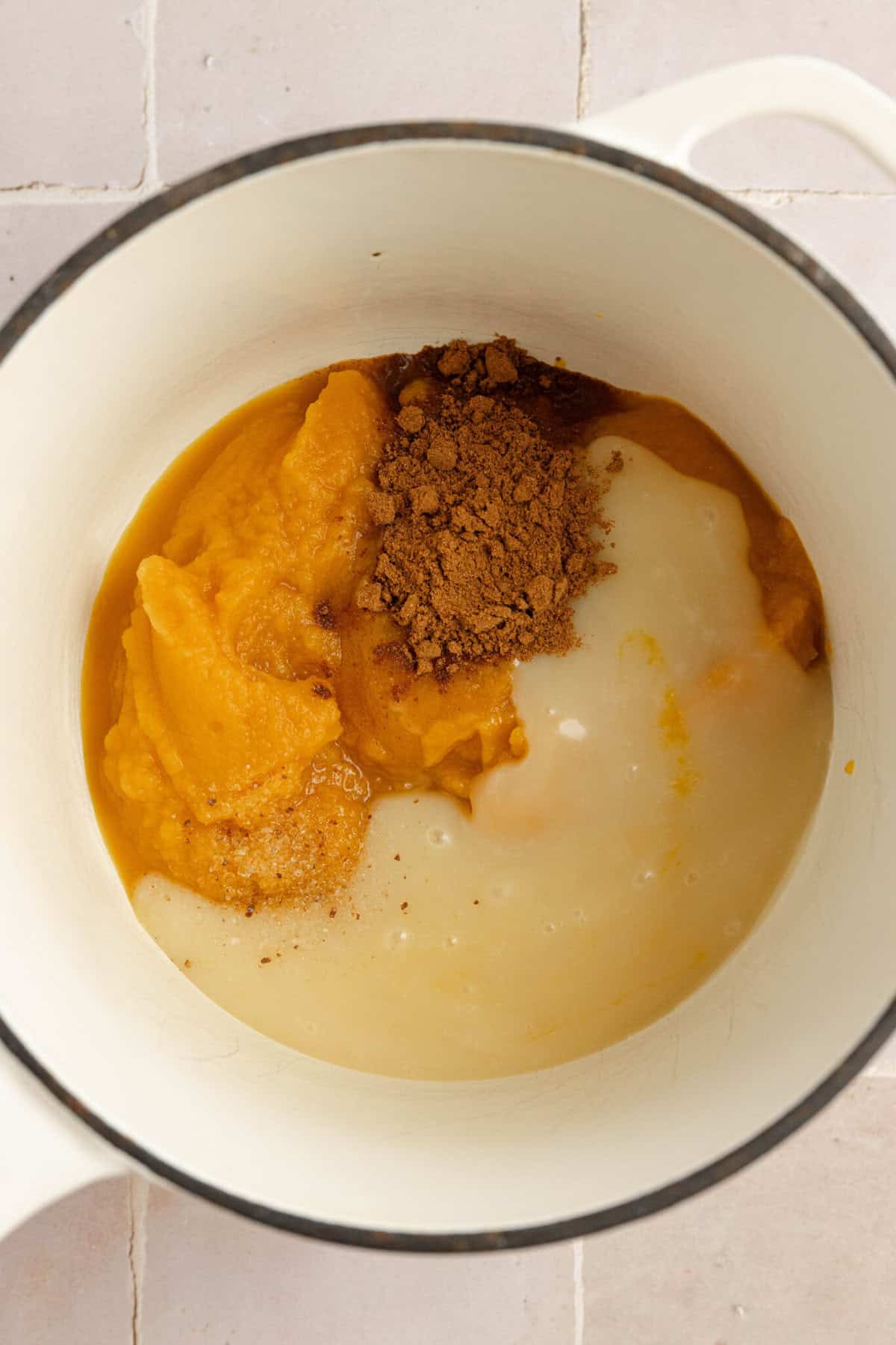 Pumpkin pie sauce ingredients in a saucepan.