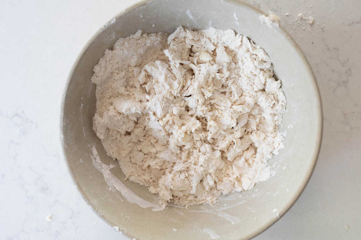 Flour and butter mixed together in a large bowl.
