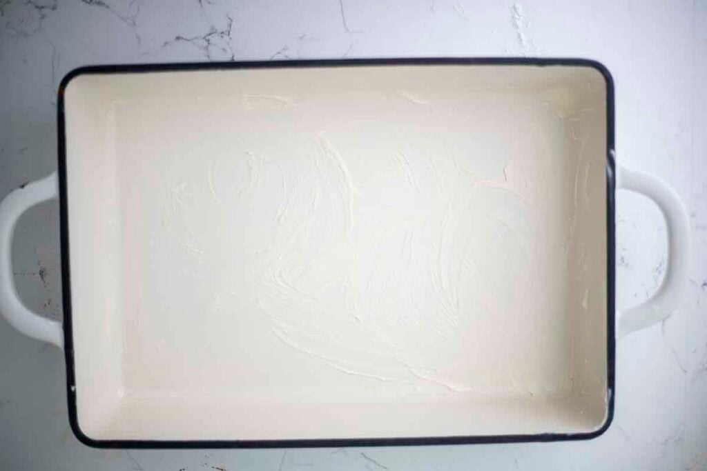 An empty 9-inch x 13-inch baking dish on the countertop.