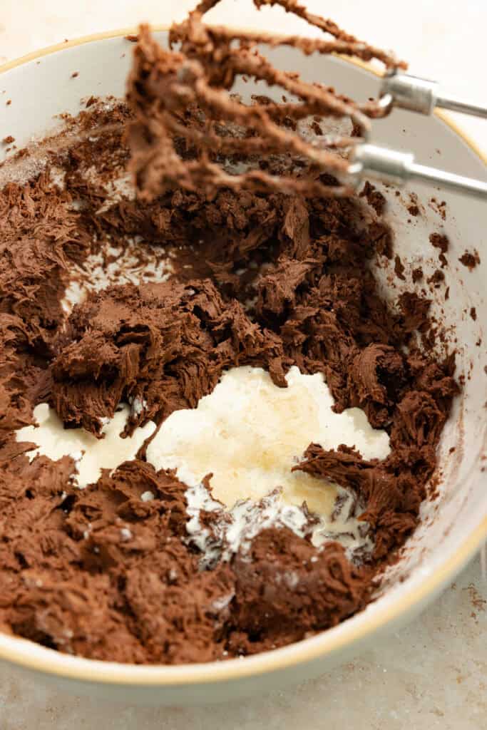 Heavy cream added to butter and sugar mixture.
