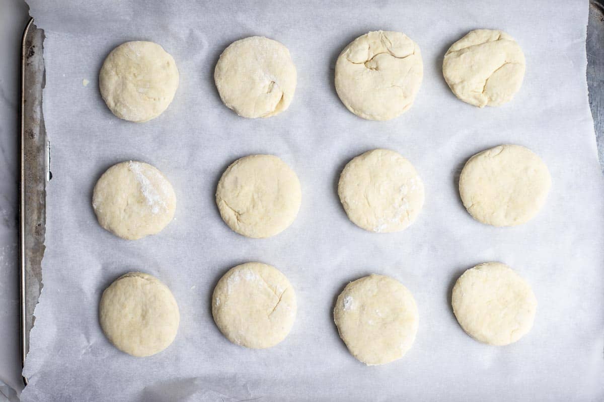 Shaped biscuits on a baking sheet.