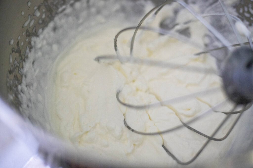 whipped cream, cream cheese, and maple syrup and vanilla in a stand mixer with a whisk attachment.