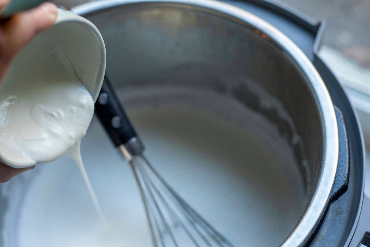 Yogurt poured in to an instant pot.