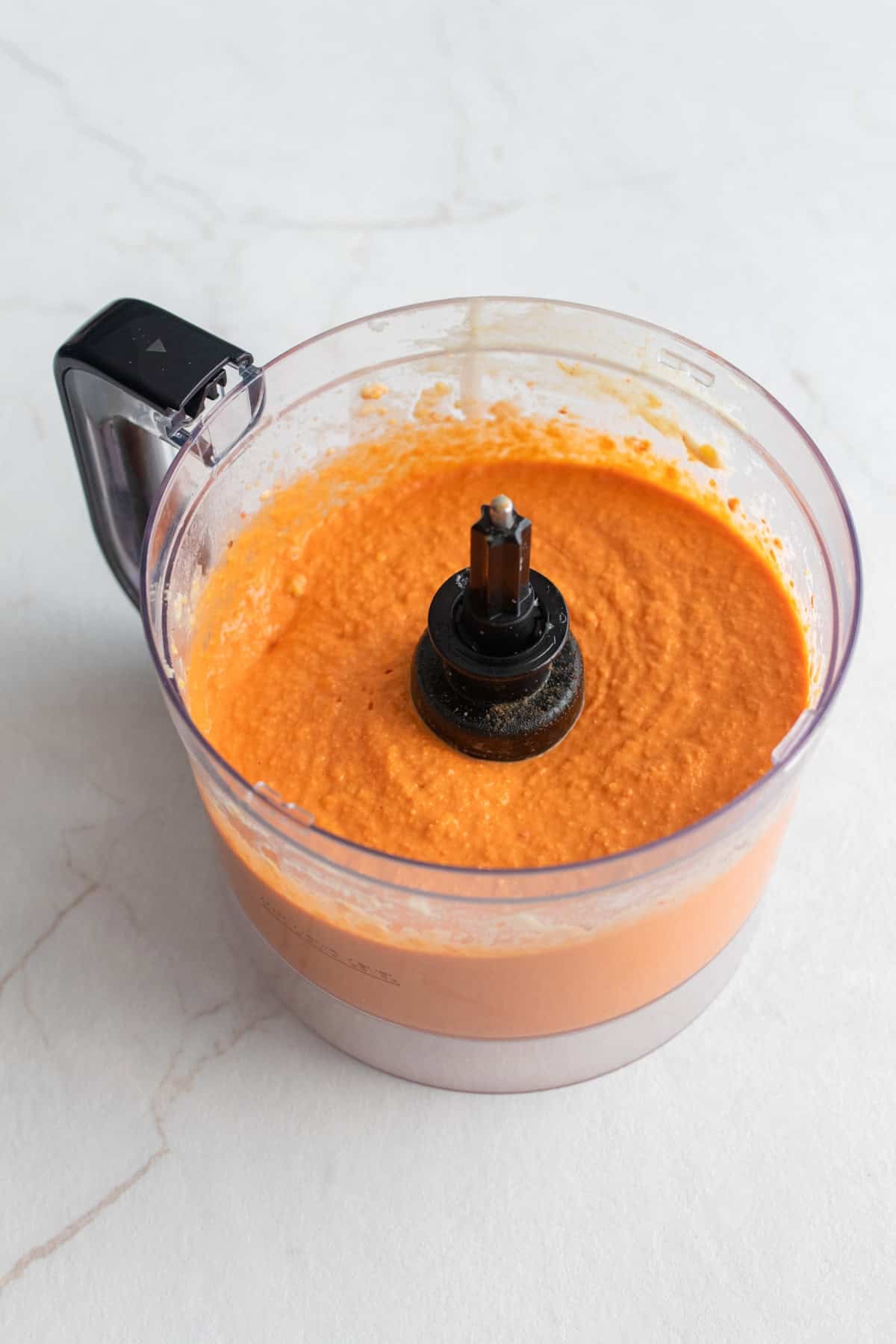 Hummus in a food processor.
