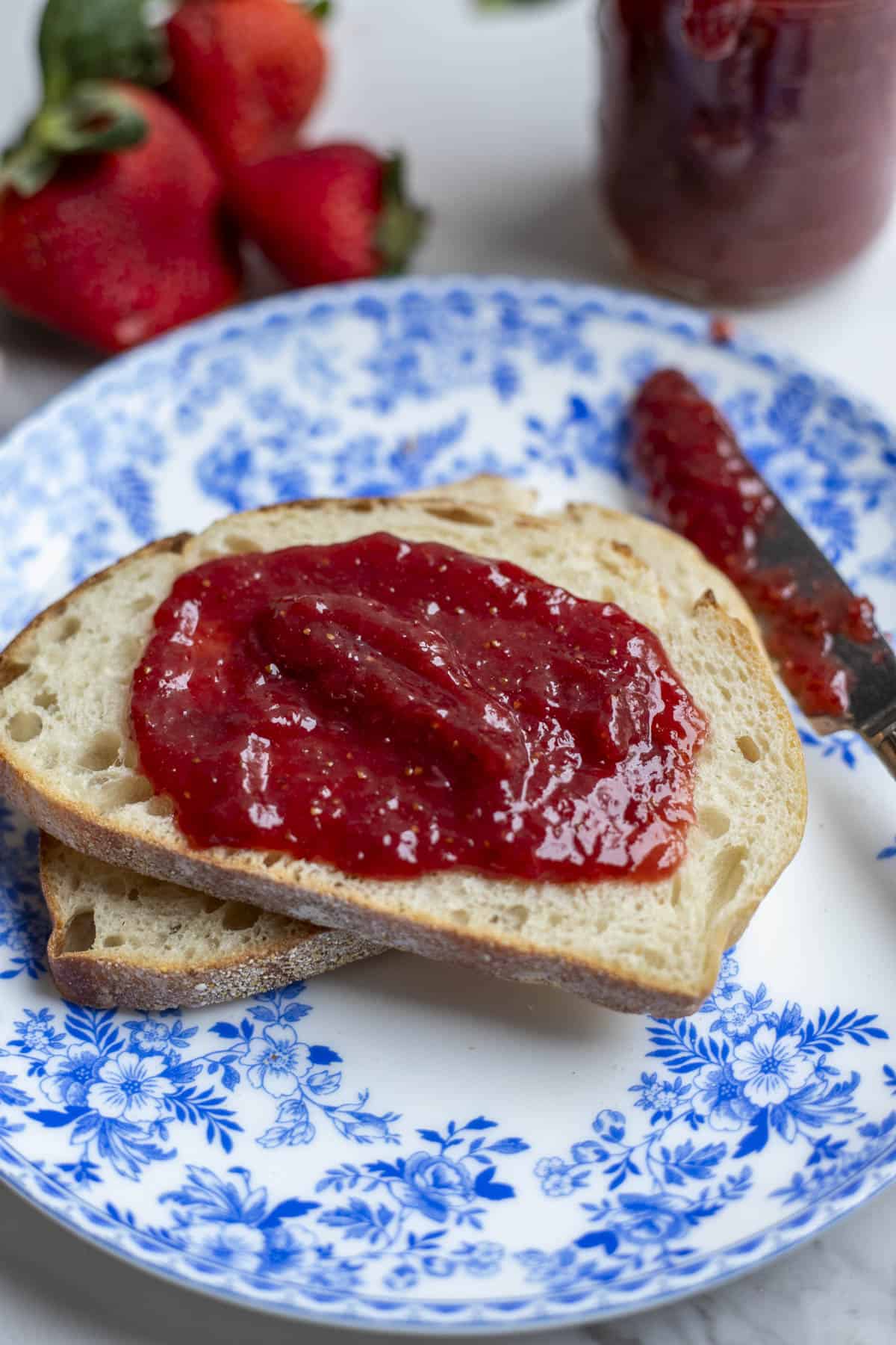 A slice of toast with jam on it. 