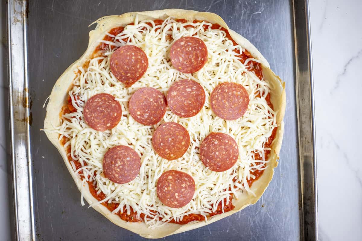 Sourdough pizza crust with toppings.