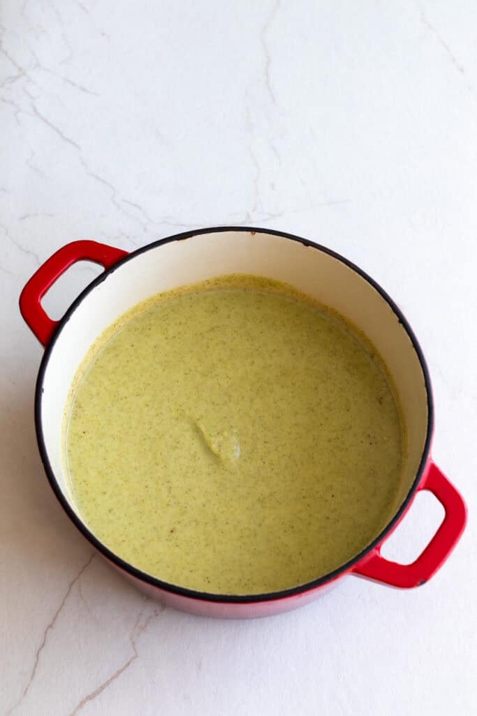 pureed broccoli soup in a dutch oven.