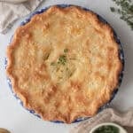 A 9 inch pie plate full of chicken pot pie.