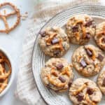 a plate of lactation cookies with chocolate chunks and pretzels.