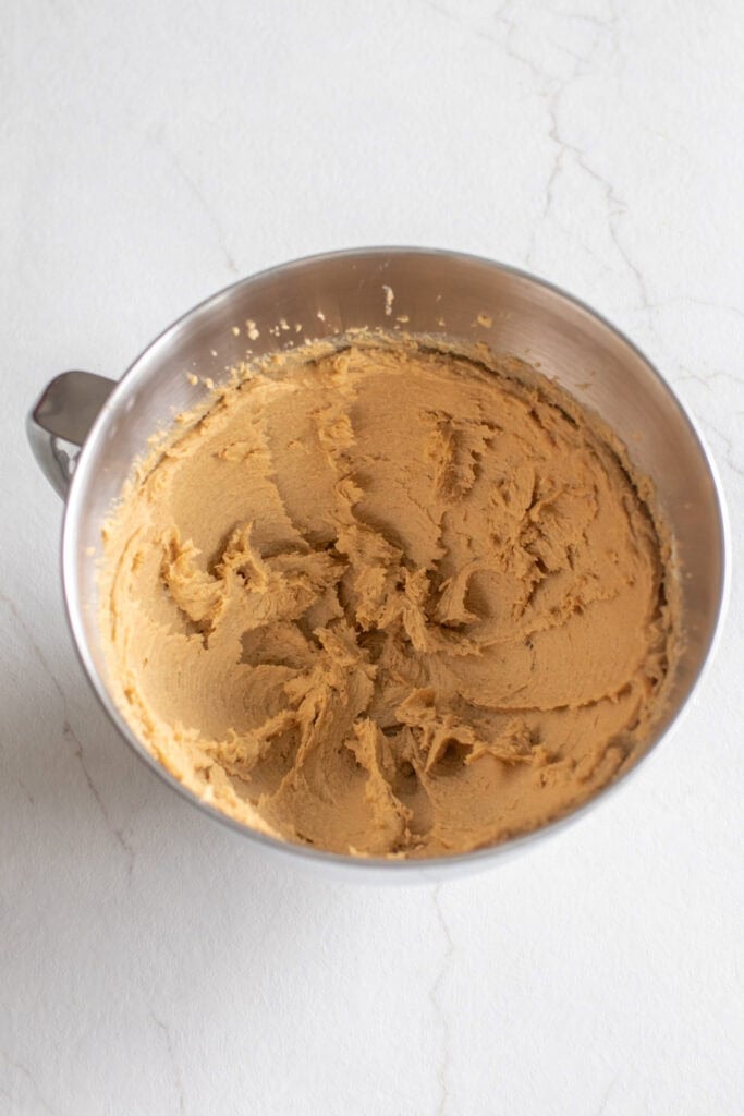Creamed butter and sugar in a stand mixer bowl.