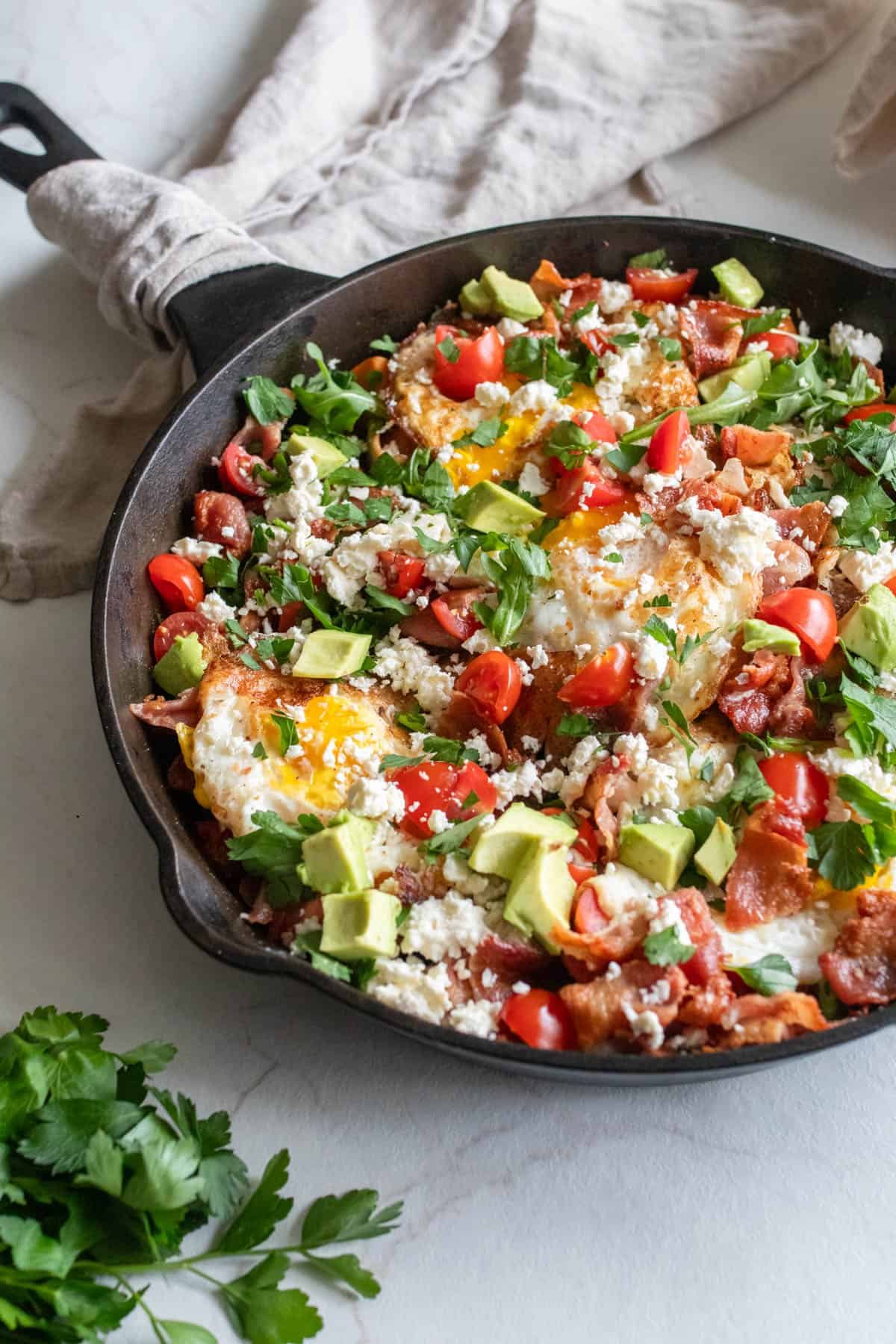 Vegetables cooked in a cast iron skillet.