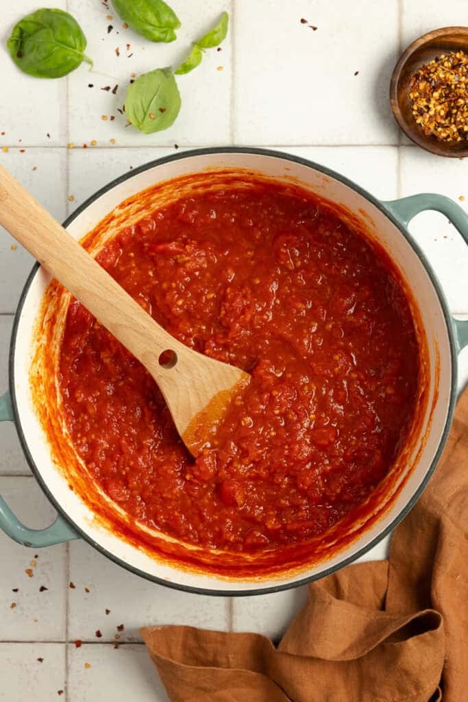 Tomato sauce cooking in a pot.