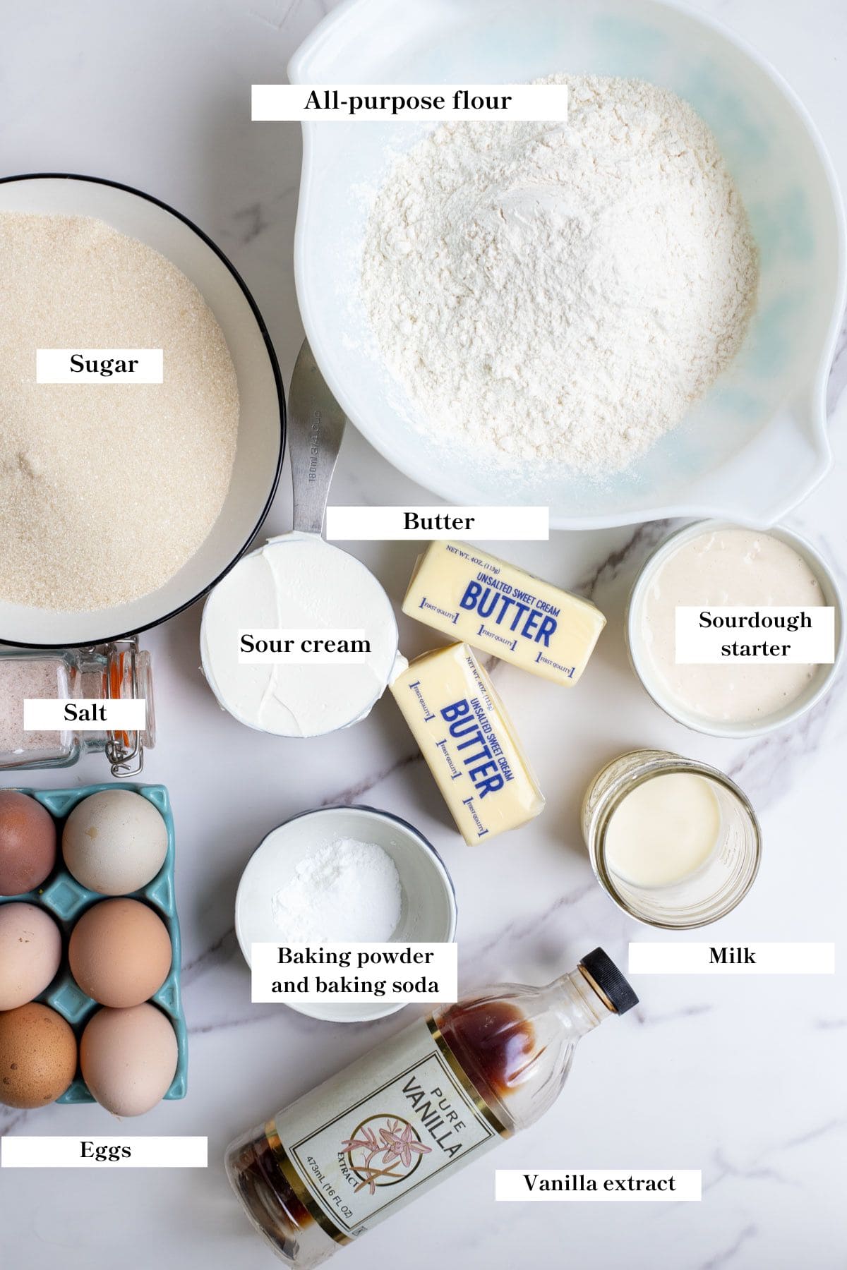 Ingredients spread out on a white countertop.