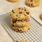 Cookies stacked on a cooling rack.
