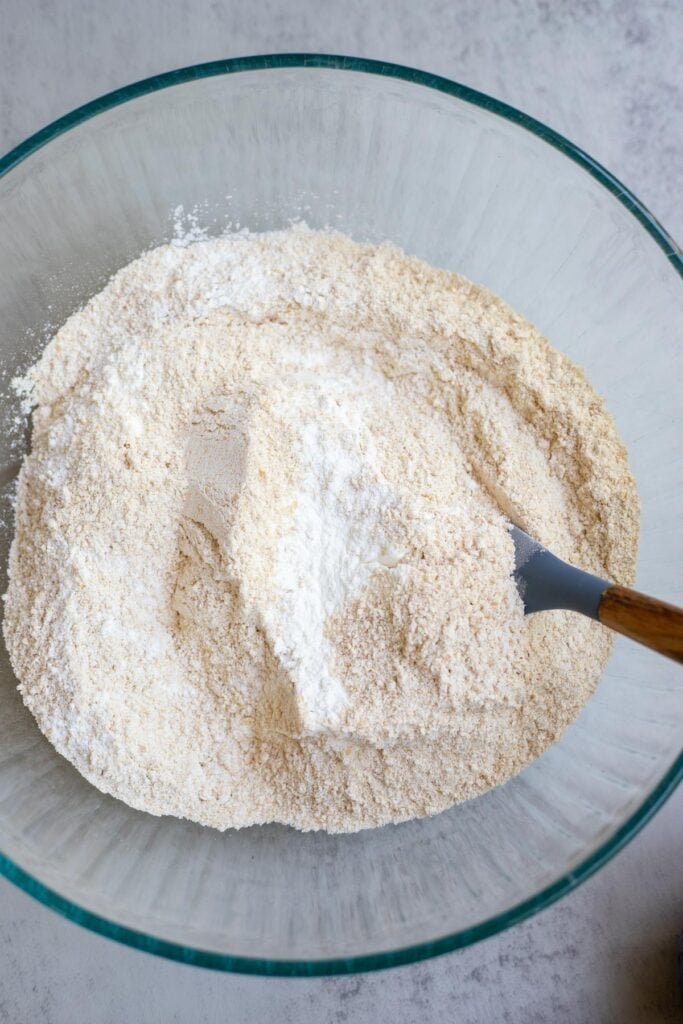 Flour, sugar, salt, and baking powder in a bowl.