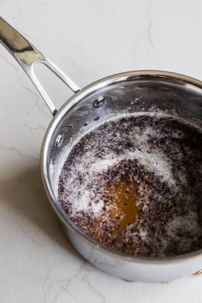 Lavender syrup steeping in a sauce pan.